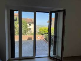 Infisso-in-PVC-bicolore-4-ante